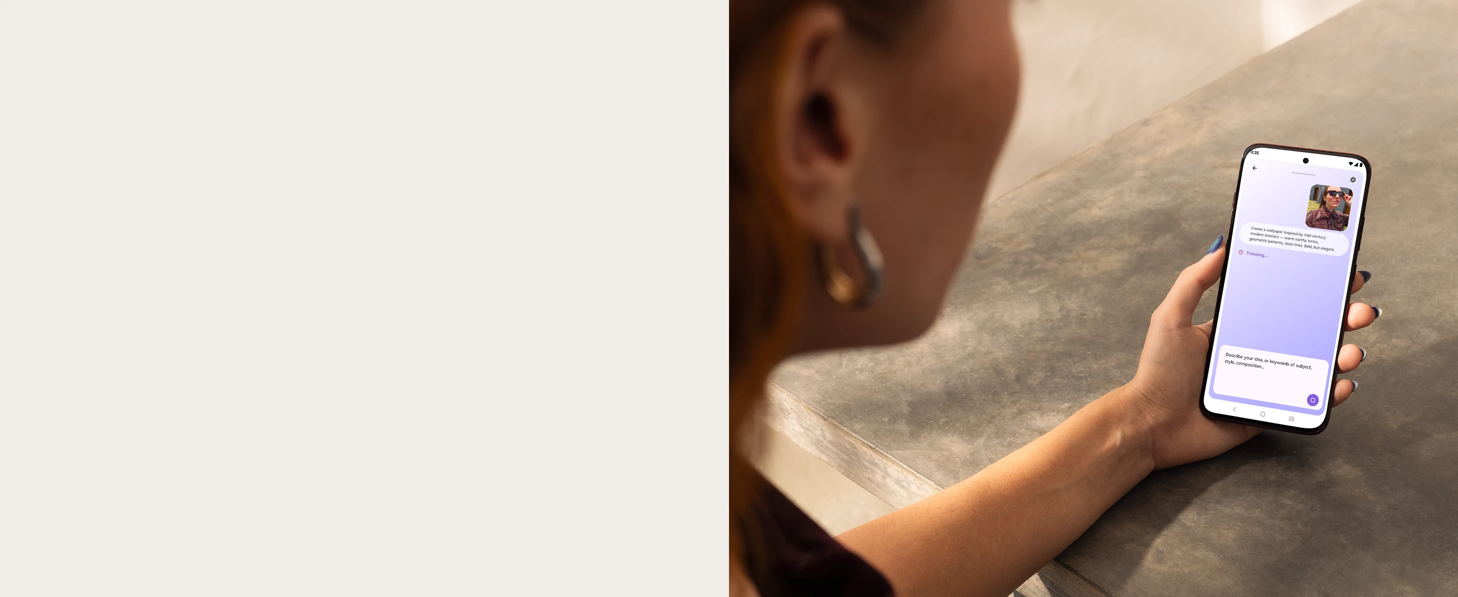 A person holds a smartphone showing a chat interface with a mid-century modern wallpaper request and a thinking status.