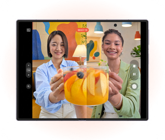An image of 2 women holding a cup and showing the dual recording feature