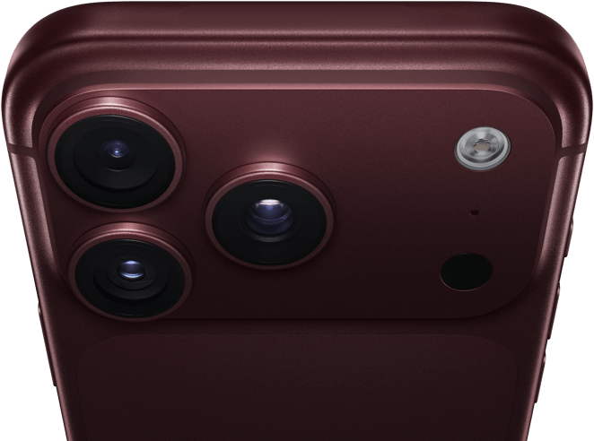 iPhone 18 Pro Max, burgundy colour (dark red), back exterior, Pro Fusion camera system at top, 3 lenses, variable aperture blades partially closed, flash, microphone and LiDAR scanner, top exterior, mobile antenna, flat sides, rounded edges