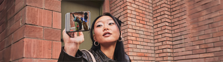 A woman using the Motorola Razr 70