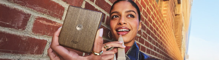 A woman using the Motorola Razr 70 Ultra